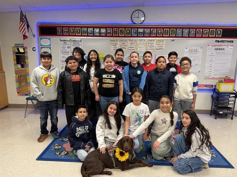 Students posing with Penny.