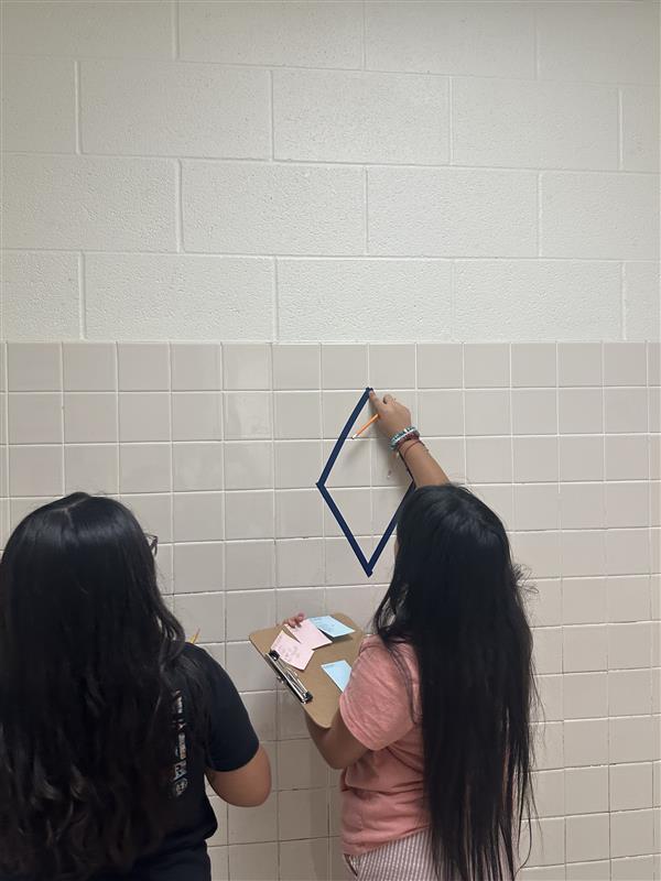 Kids working with fractions on a number line.