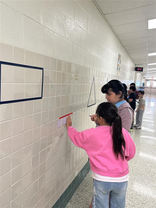 Kids working with fractions on a number line.