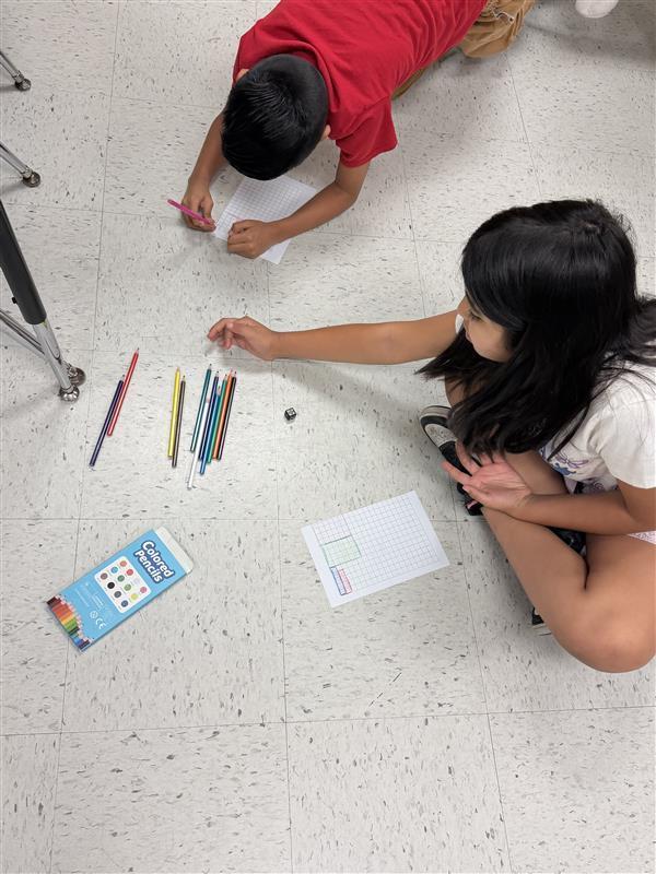 Kids engaged in game activity.