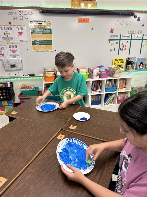 Kids completing Earth Day Activity.
