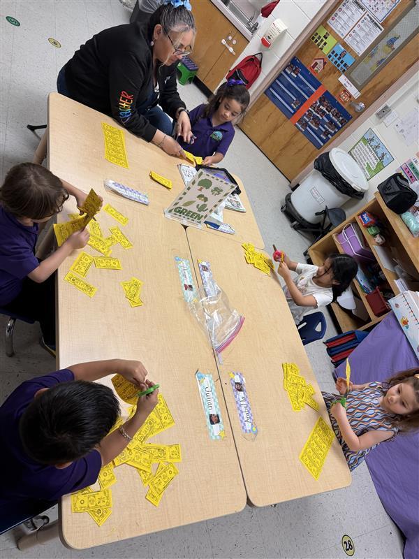Students cutting cougar cash.