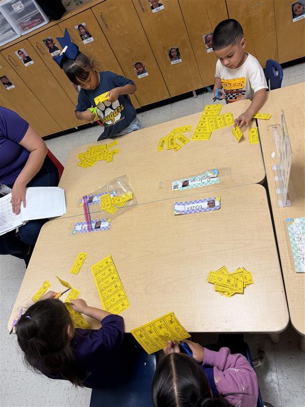 Students cutting cougar cash.