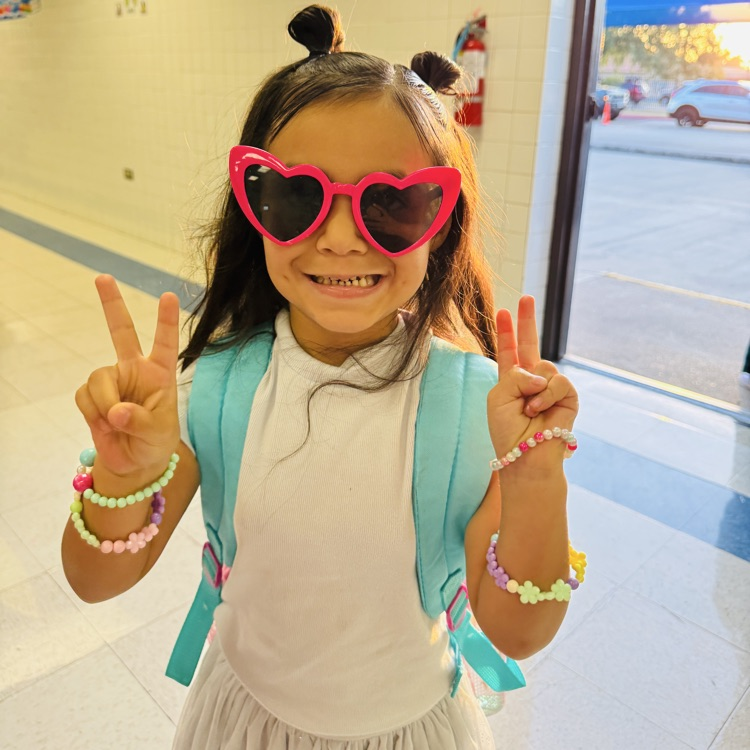 student smiles to start her day in the morning
