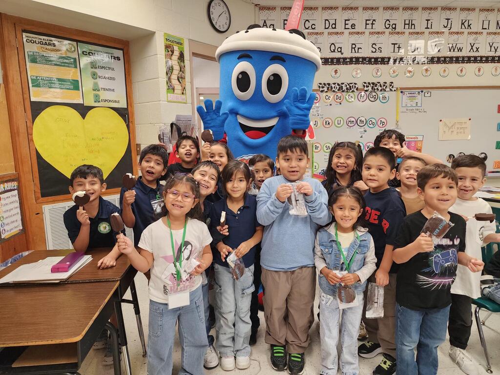 Kids celebrating their perfect attendance treat.