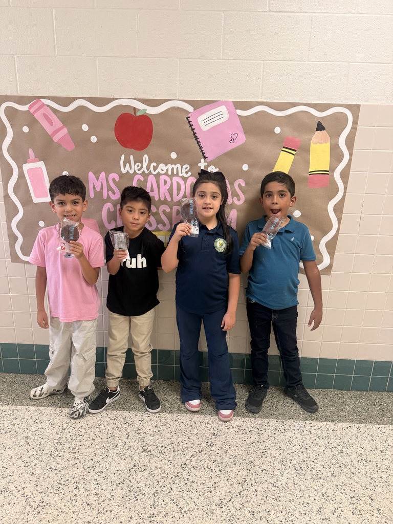 Kids celebrating their perfect attendance treat.