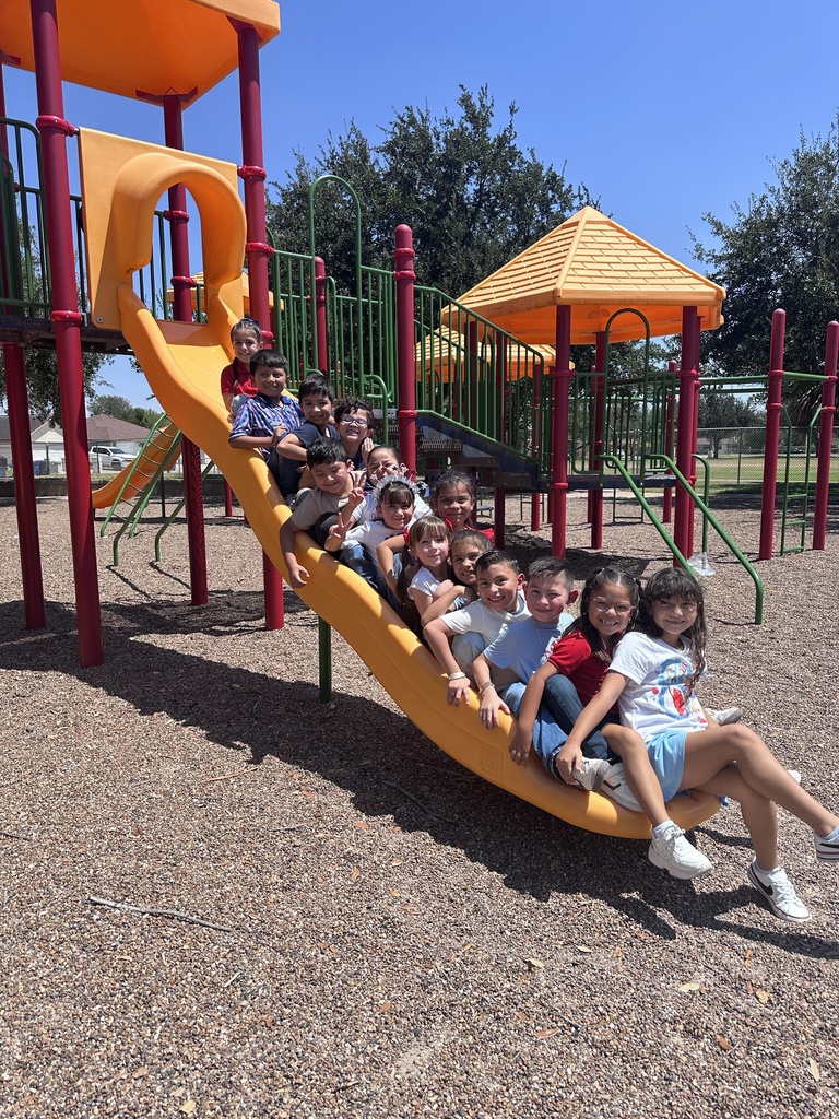 Students posing wearing red, white, and blue.