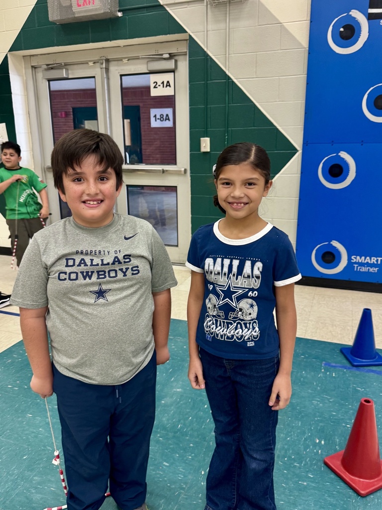 Kids posing during learning activity.