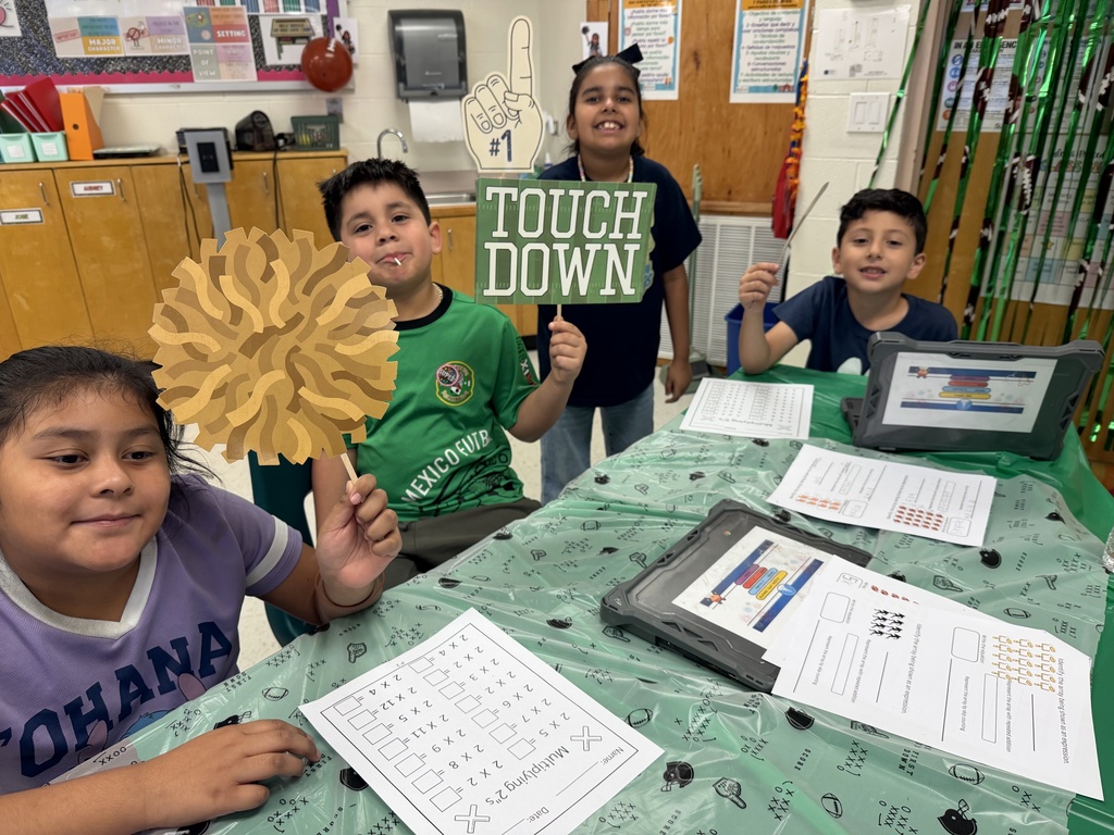 Kids posing during learning activity.