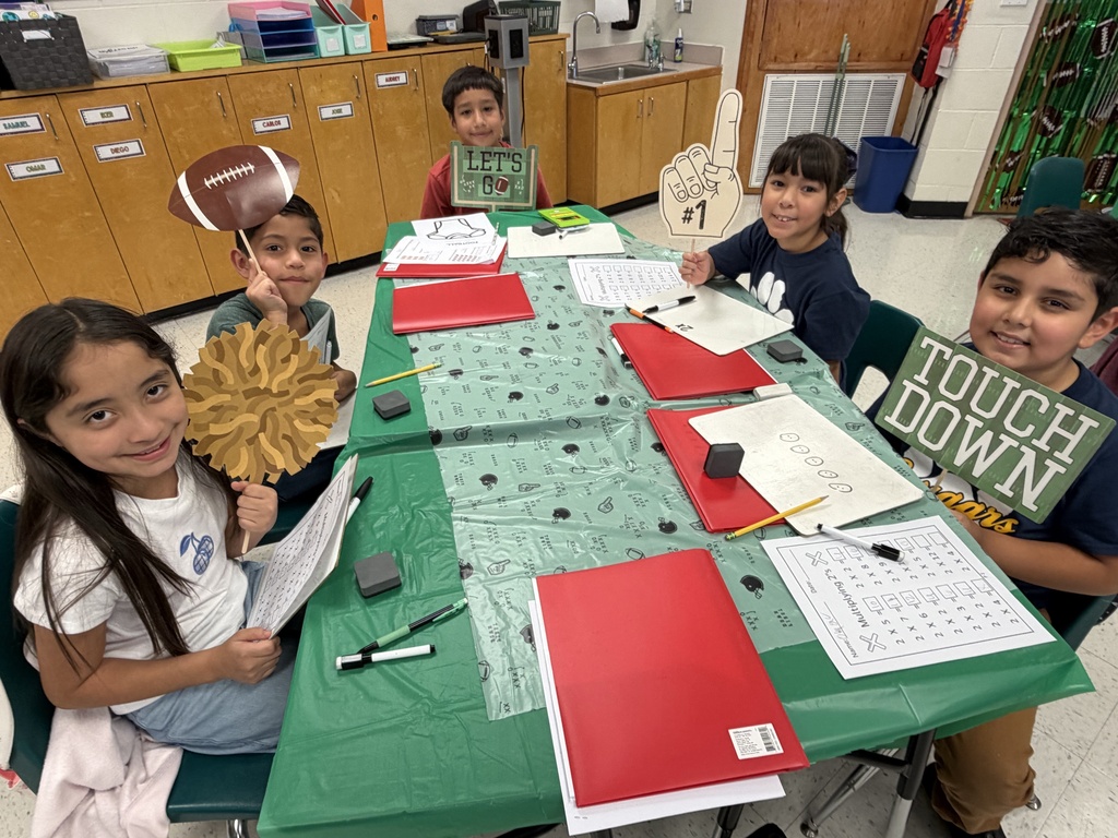 Kids posing during learning activity.