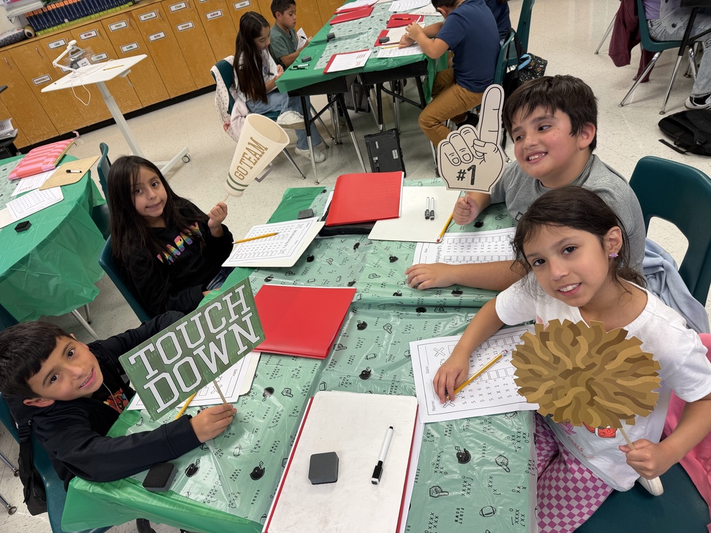 Kids posing during learning activity.