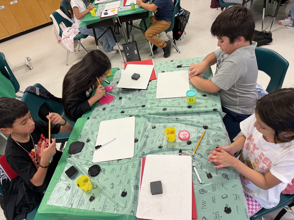 Kids working during learning activity.