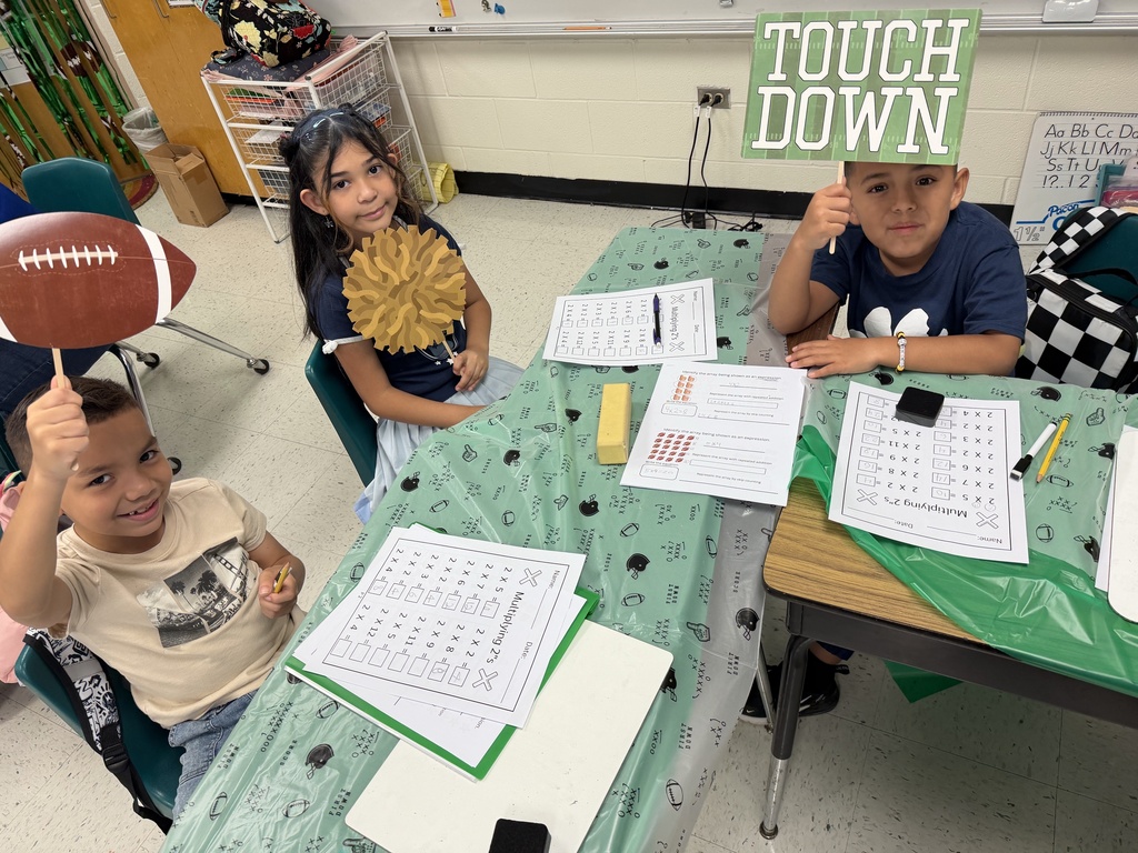 Kids posing during learning activity.