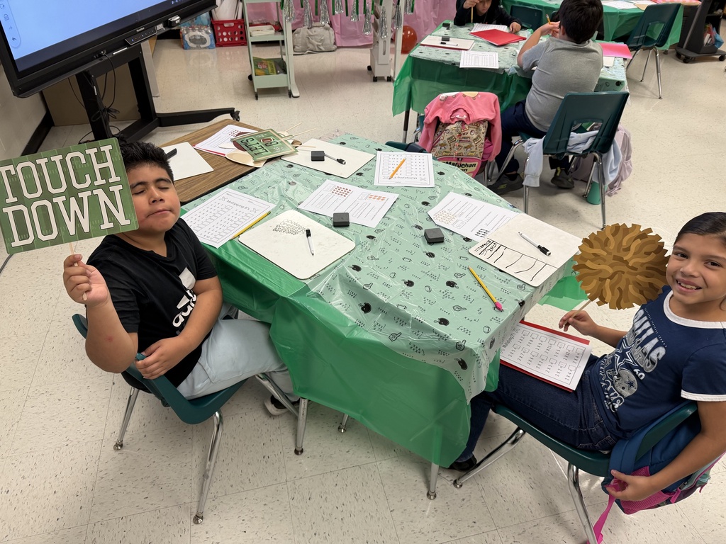 Kids posing during learning activity.