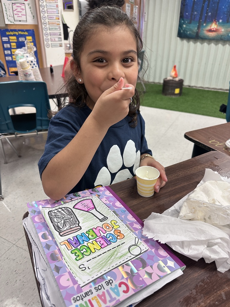 Student eating ice cream.