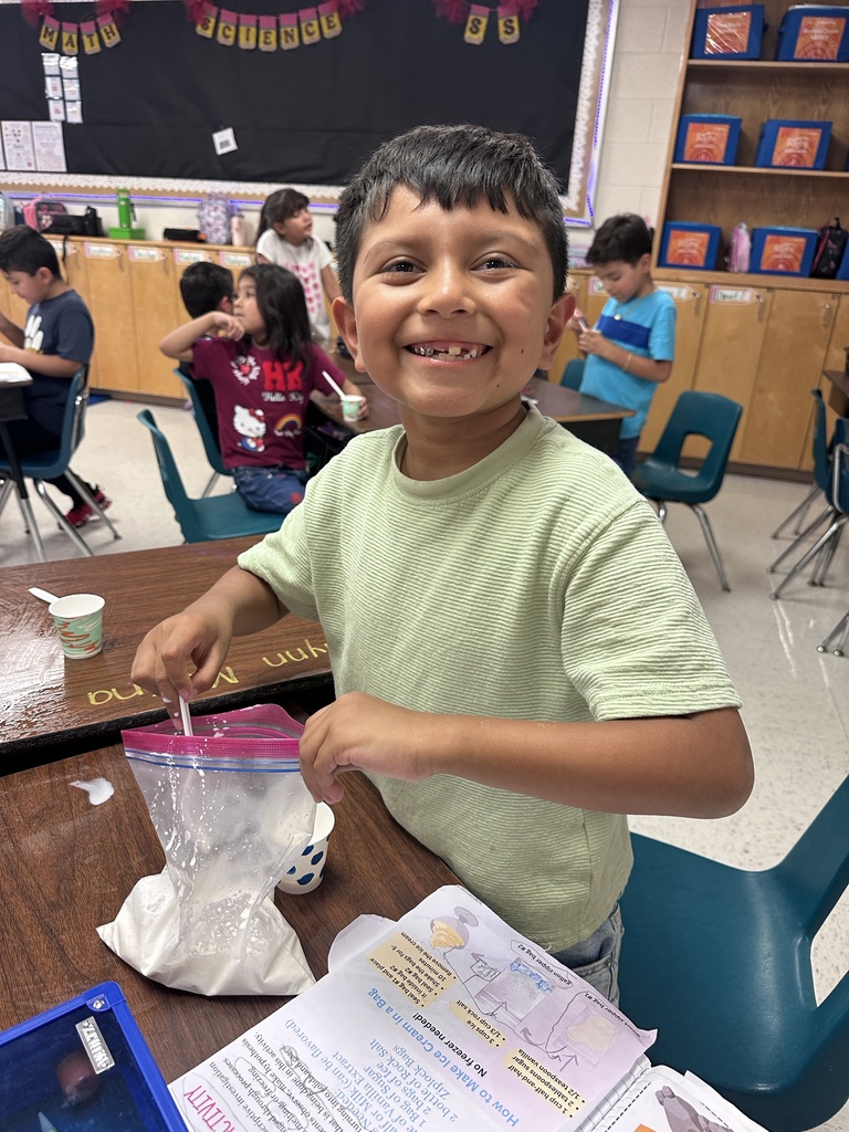 Student eating ice cream.