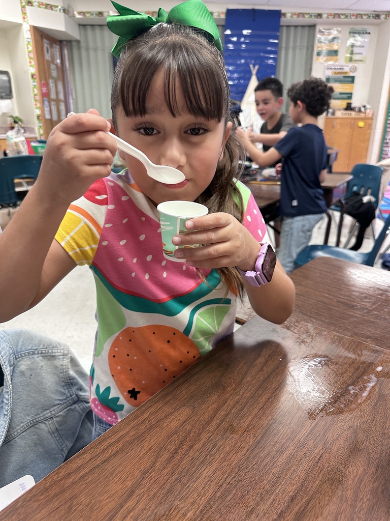 Student eating ice cream.