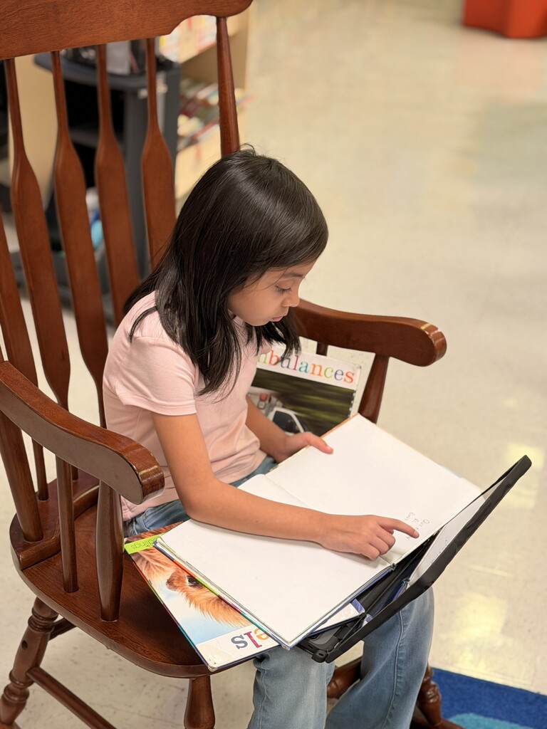 Student reading at the library.