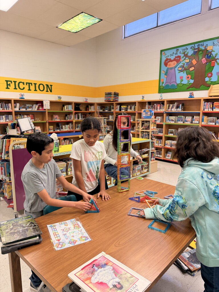 Students creating at the library.