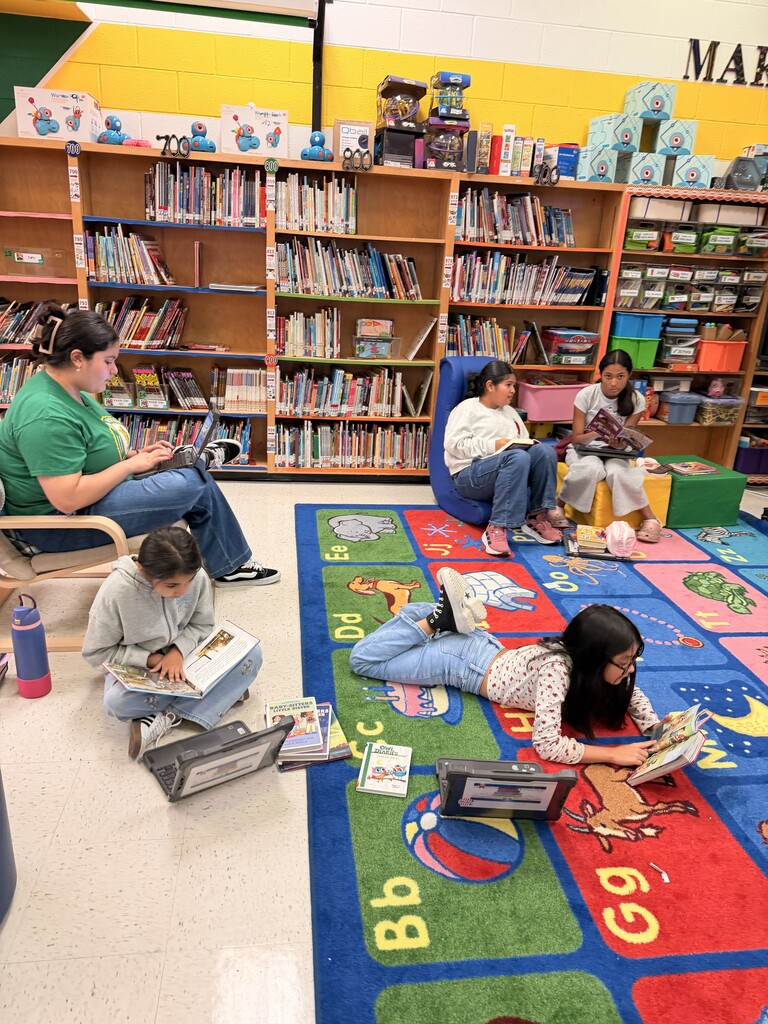 Students reading at the library.