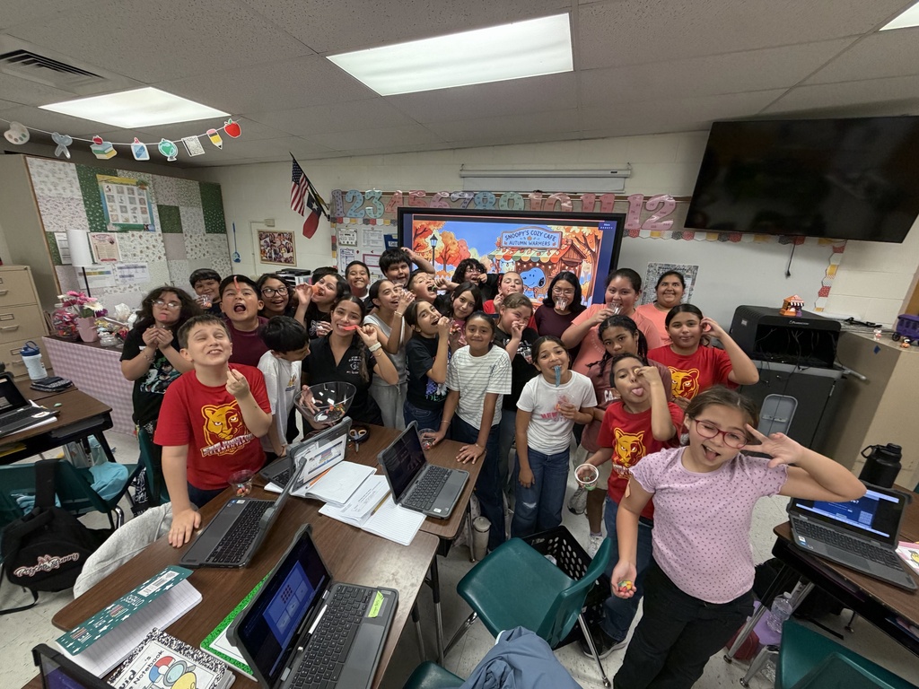 Students posing for science activity.