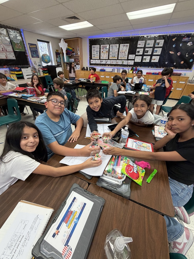Kids posing during a science lesson.
