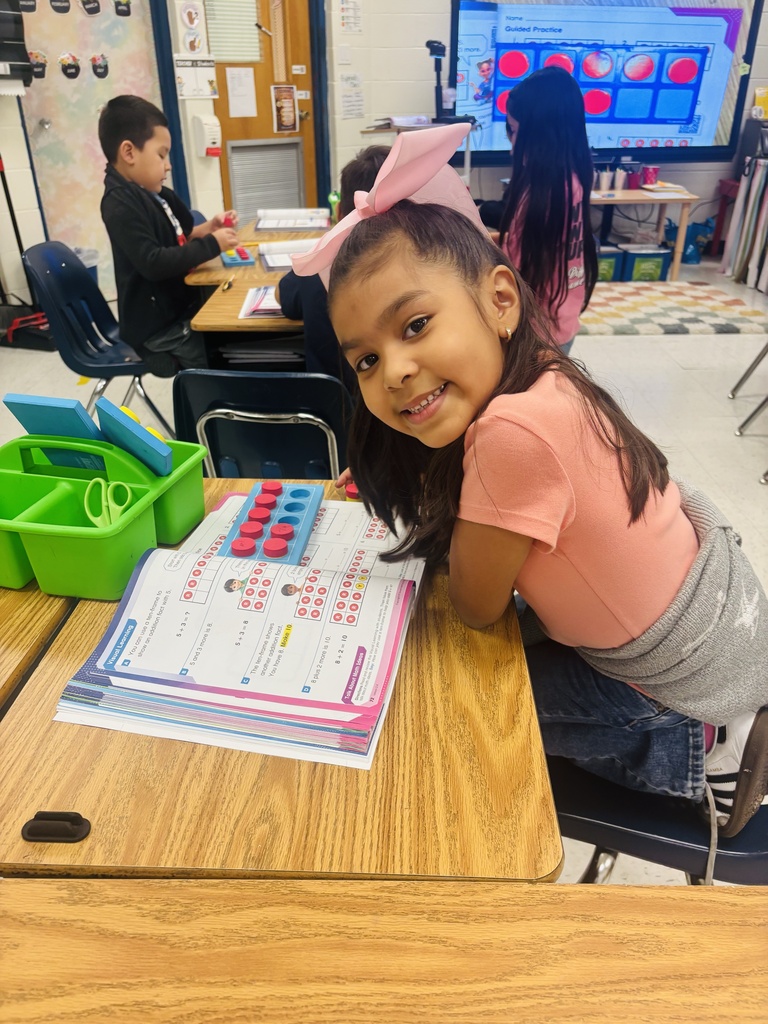 Our first graders are growing their math skills through hands-on learning💙