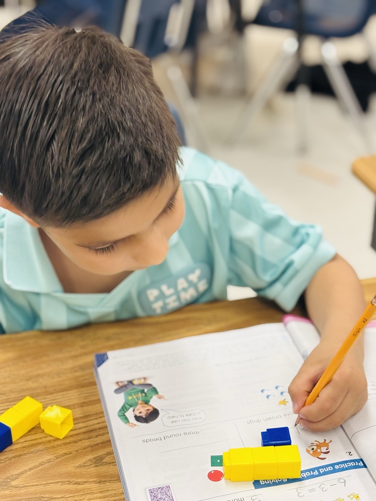 Our first graders are growing their math skills through hands-on learning💙