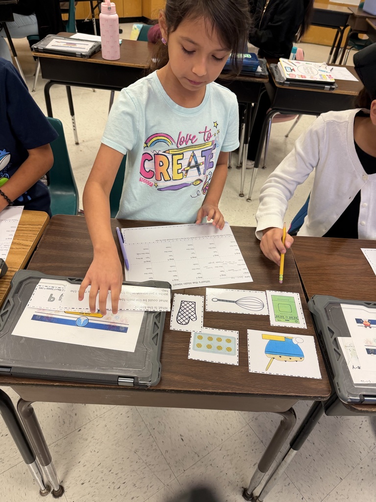 Students working on main idea activity.
