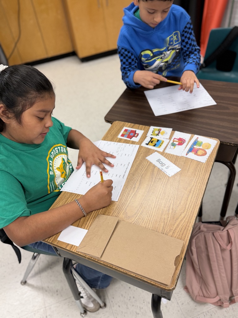 Students working on main idea activity.