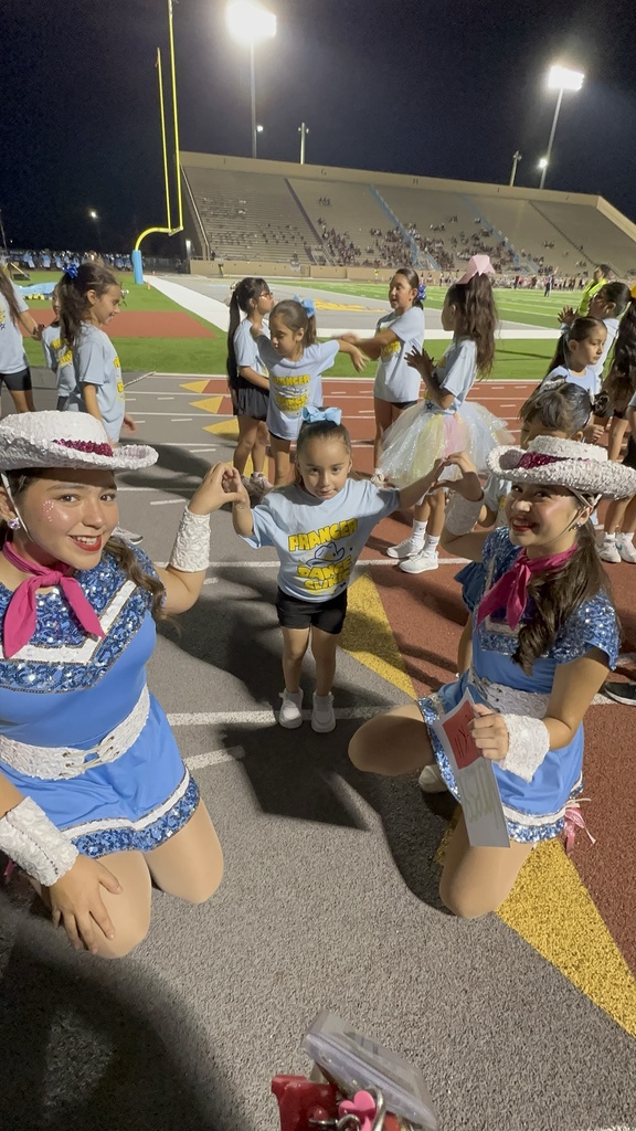 Cougarettes posing during half-time performance.