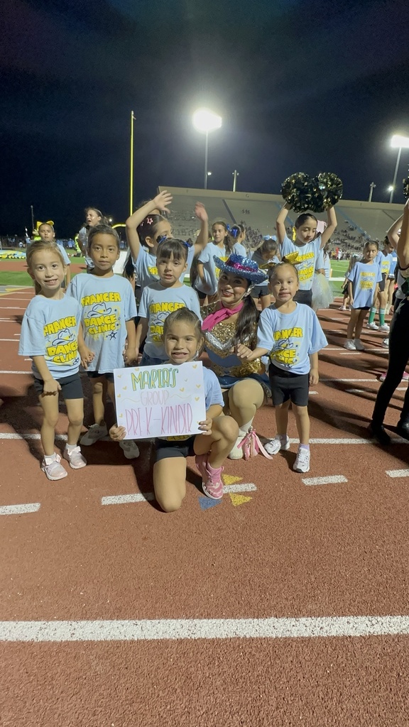 Cougarettes posing during half-time performance.
