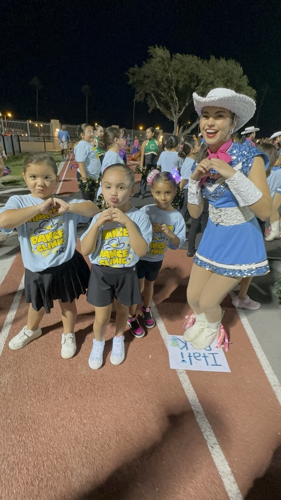 Cougarettes posing during half-time performance.