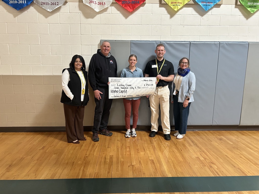 Teacher receiving grant