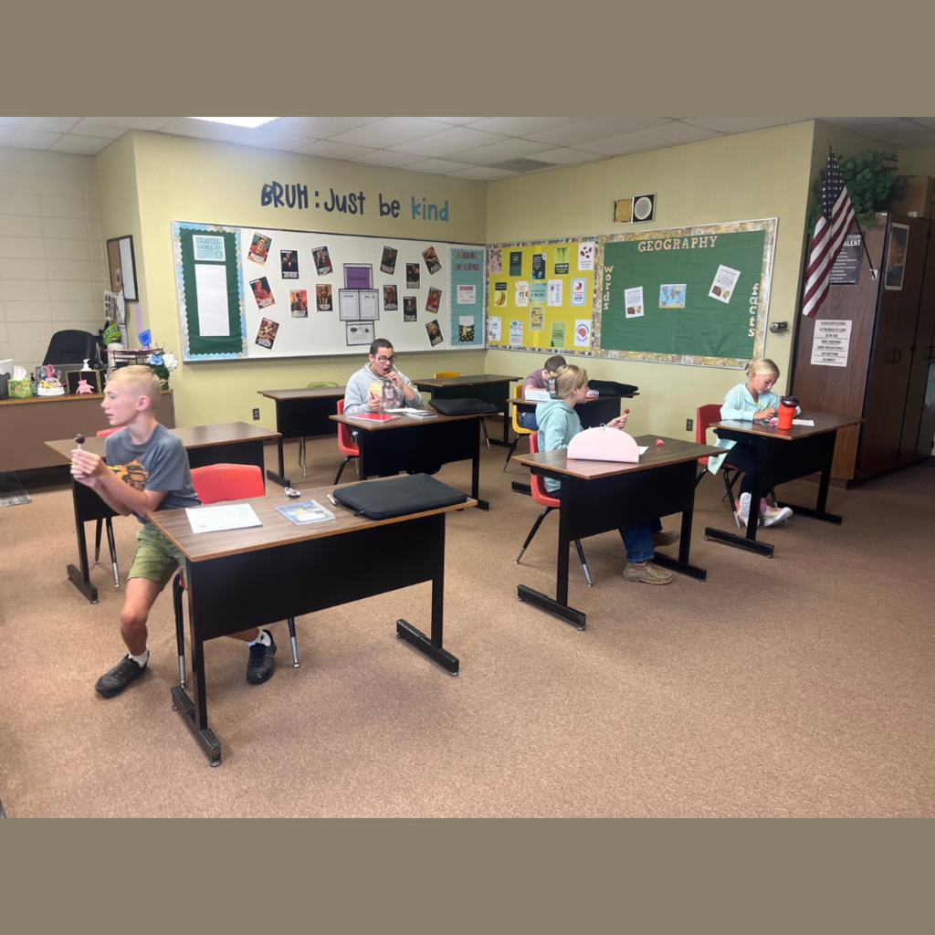 Junior high students eating Tootsie Pops