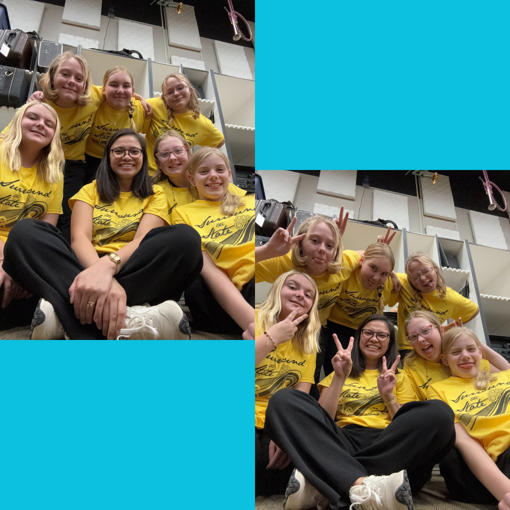 Six junior high girls posing with their music teacher