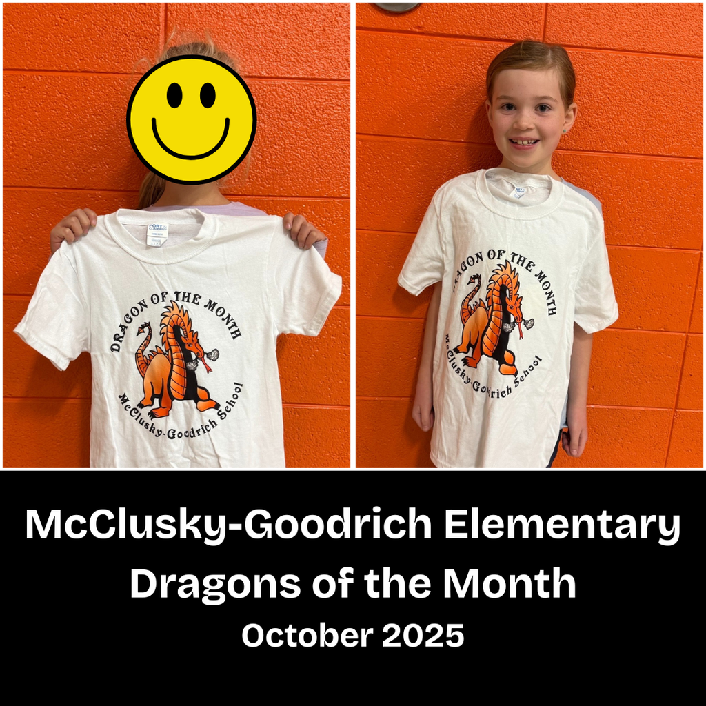 Two elementary students holding Dragon of the Month t-shirts