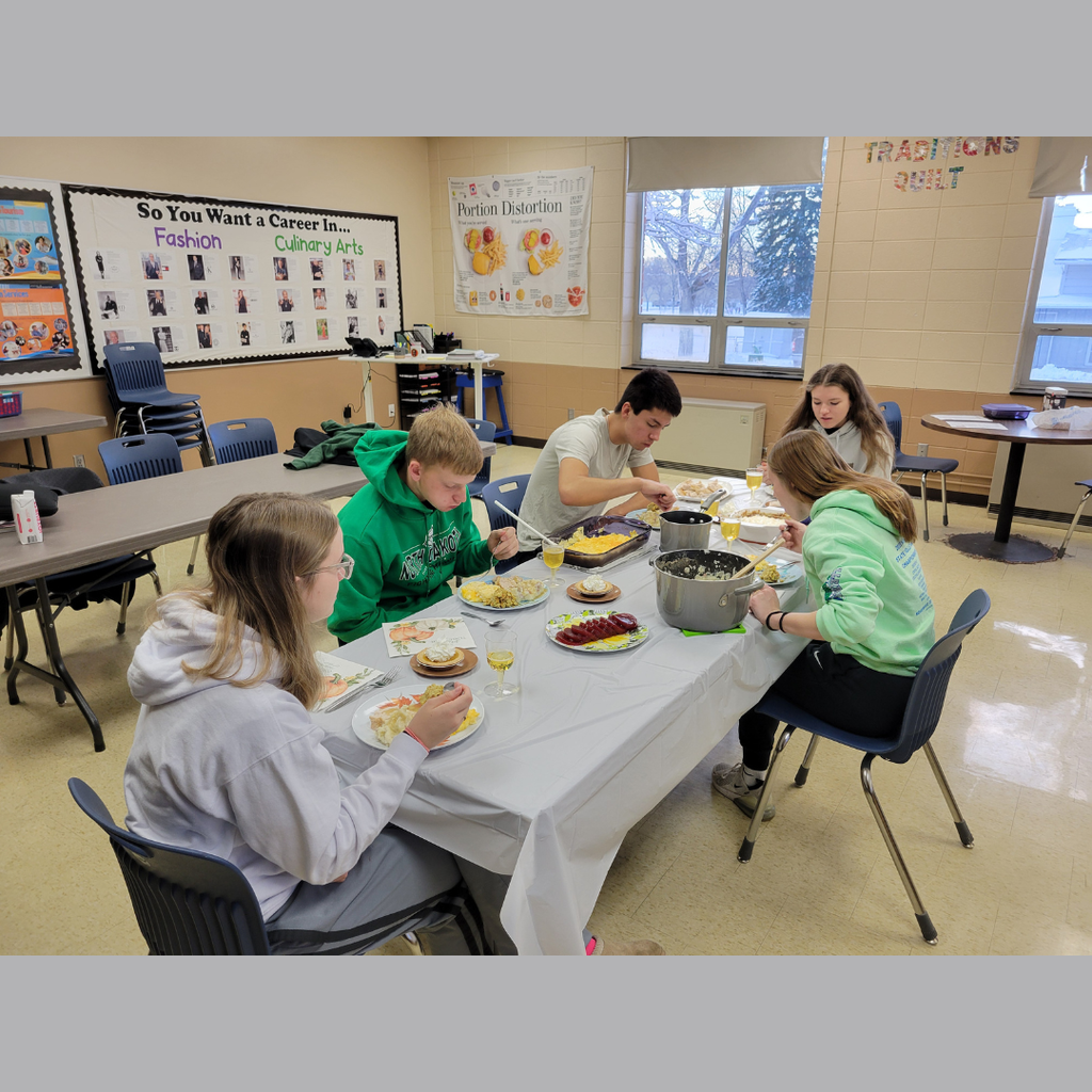 Five high school students eating Thanksgiving dinner