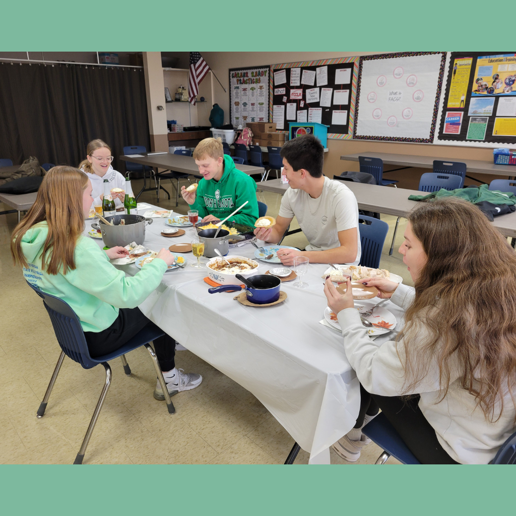 Five high school students eating Thanksgiving dinner