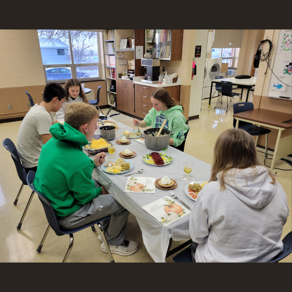 Five high school students eating Thanksgiving dinner