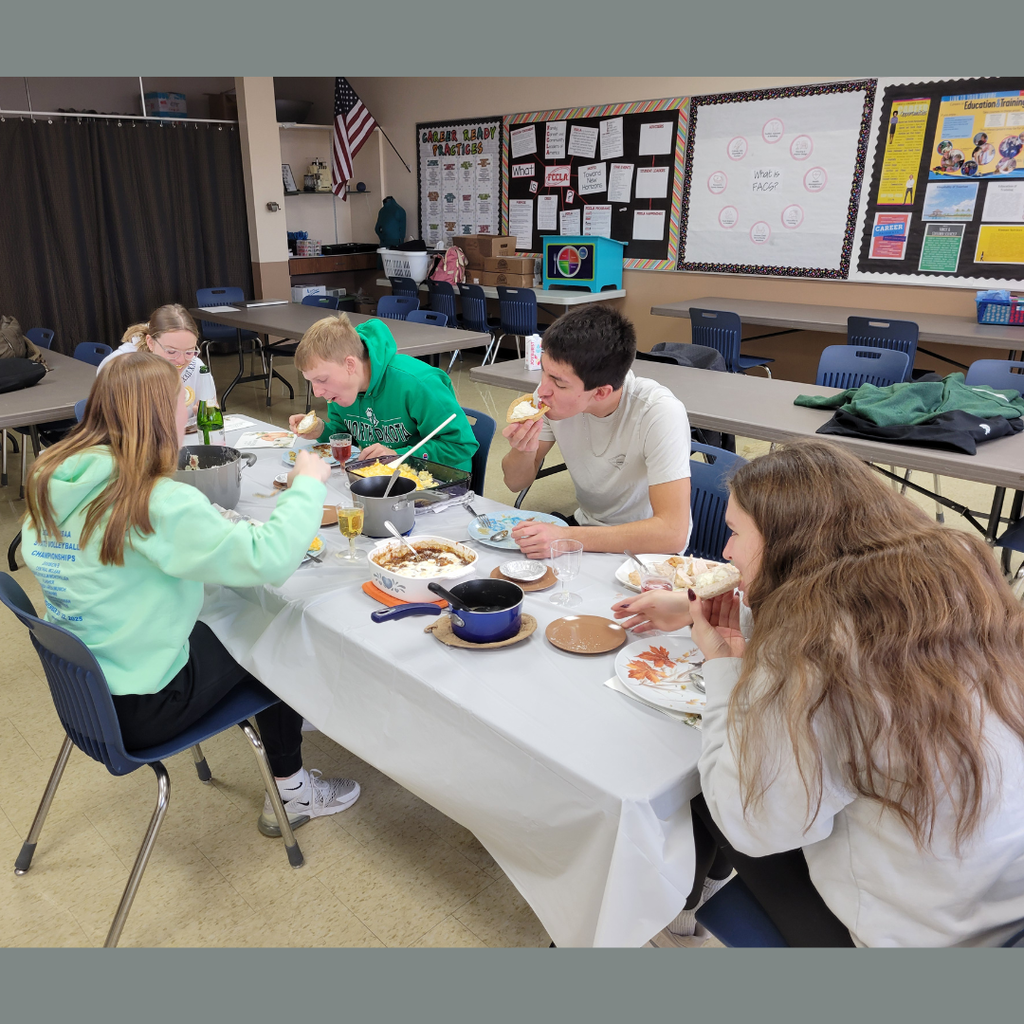 Five high school students eating Thanksgiving dinner
