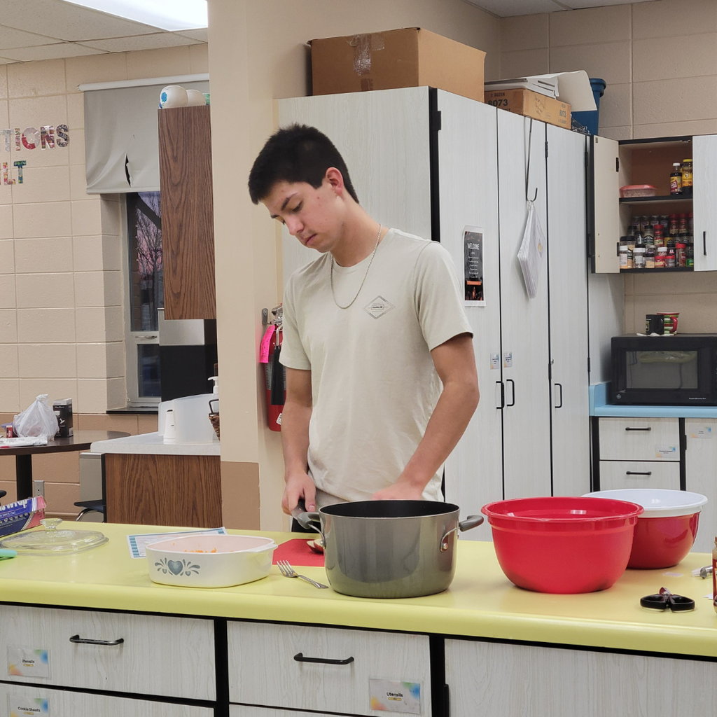 A high school student making Thanksgiving dinner
