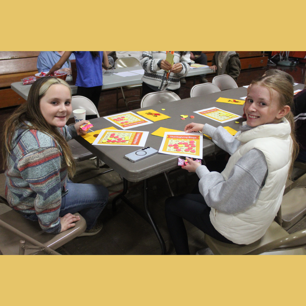 Two elementary students playing Bingo