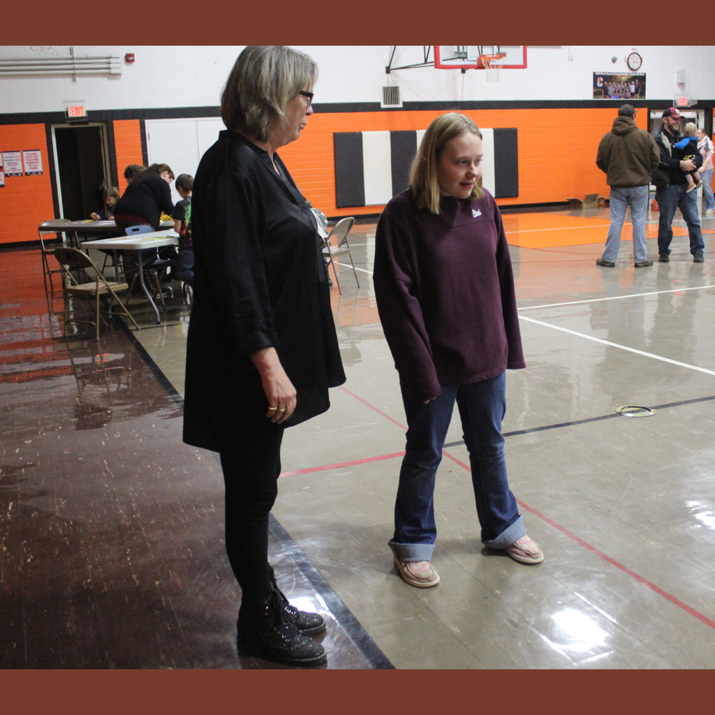 A junior high student listening to a teacher