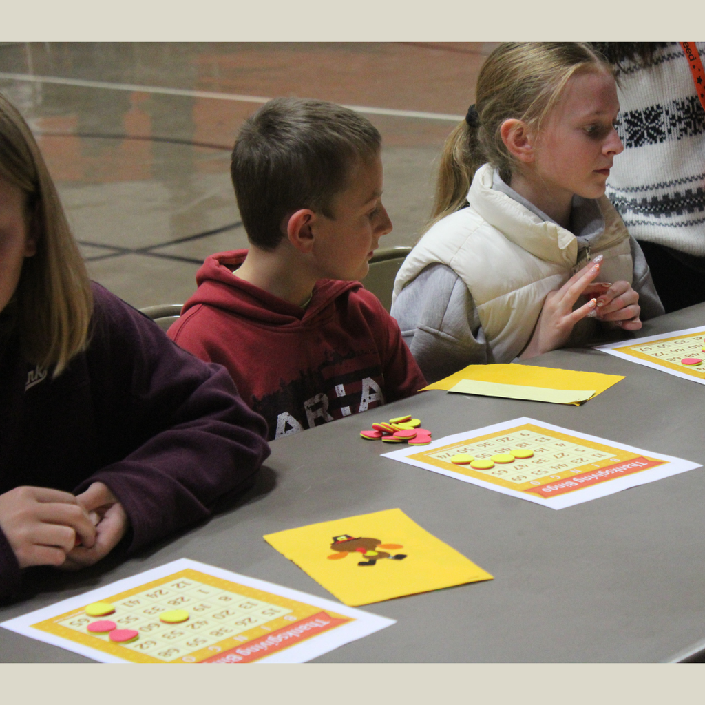 Two elementary students playing Bingo