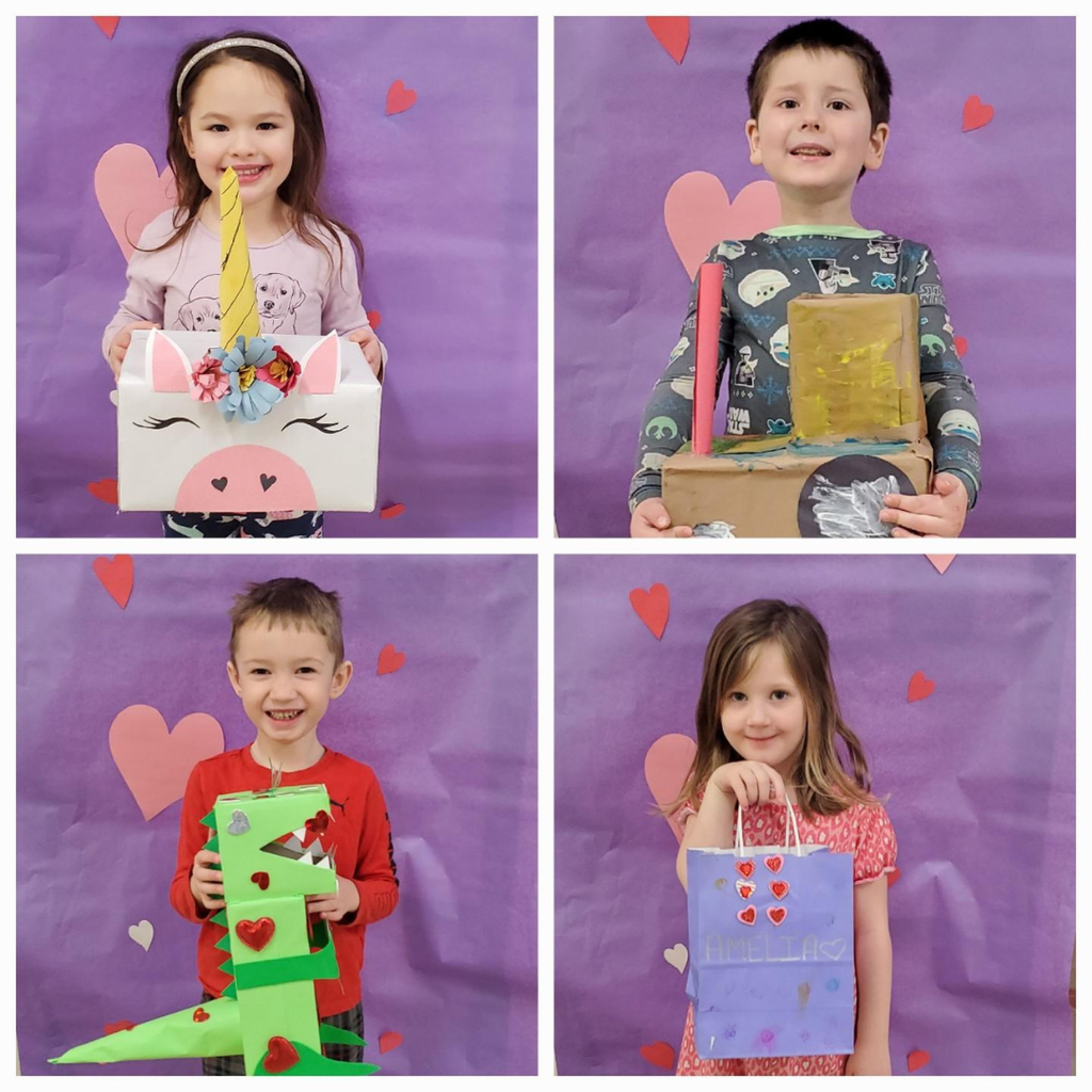 Preschool students posing with their homemade Valentine's Day boxes