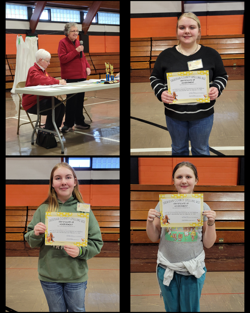Junior high students holding certificates