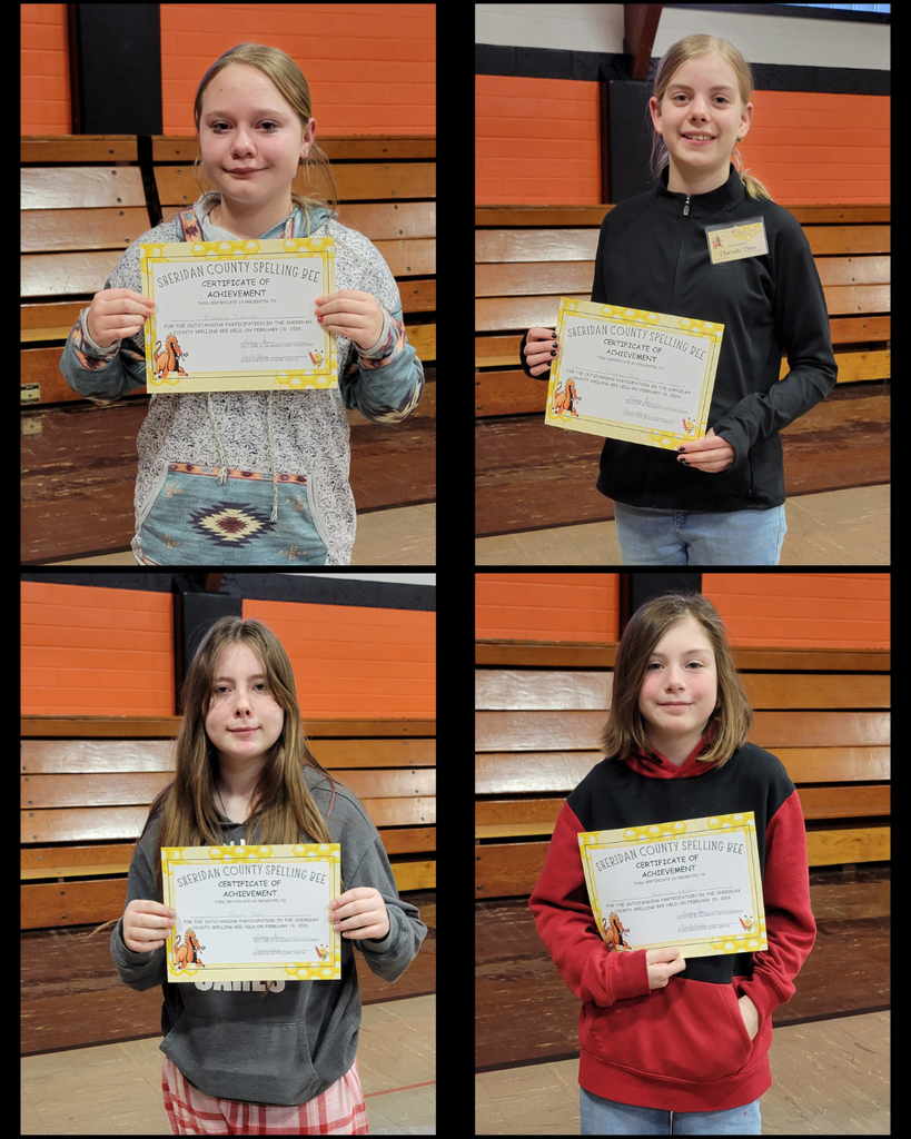 Junior high students holding certificates