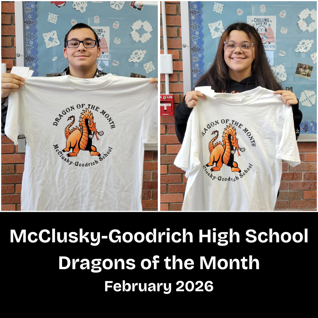 Two high school students holding Dragon of the Month t-shirts