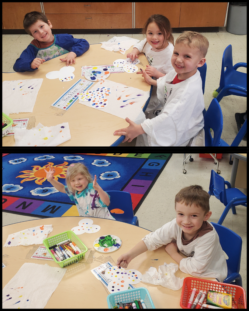 Preschool students making fingerprint flowers